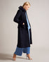 LYDDIIA-Outerwear-Introducing the ultimate cosy coat. LYDDIIA is your stylish shield against the elements. Slip into the regular fit adorned with faux fur cuffs and collar for an extra touch of glam. The button fastening and belted waist create a chic silhouette, while pockets keep your hands toasty. Longline coat Regular fit Faux fur cuffs and collar Button fastening Belted waist Pockets Jara is 5'10.5" / 1.79m and wears Dark Blue in a Ted size 1- Ted Baker Romania